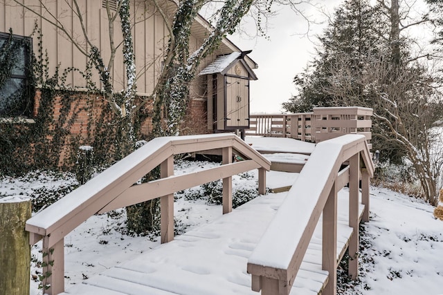 view of snow covered deck