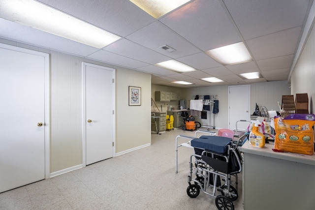 interior space featuring a paneled ceiling