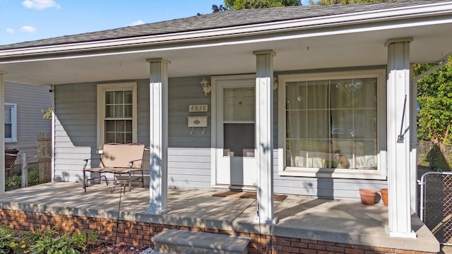 entrance to property featuring a porch