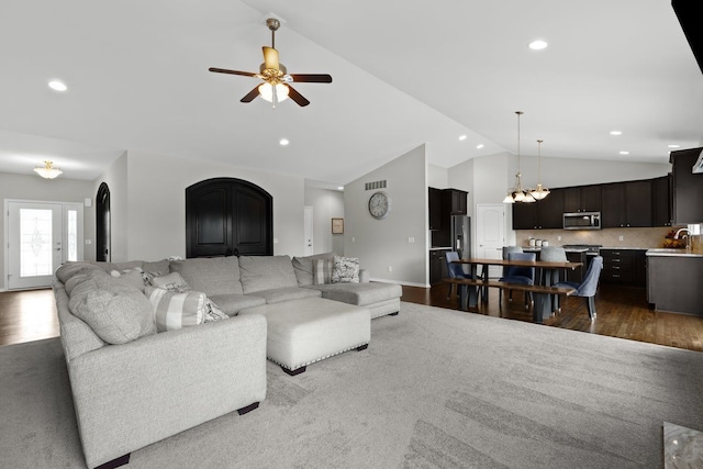 living area with baseboards, lofted ceiling, dark wood-style floors, ceiling fan, and recessed lighting