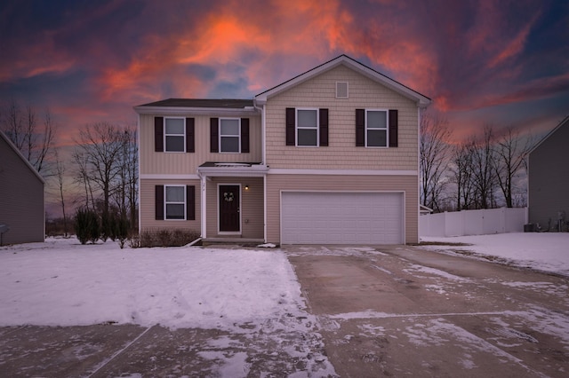 front of property featuring a garage