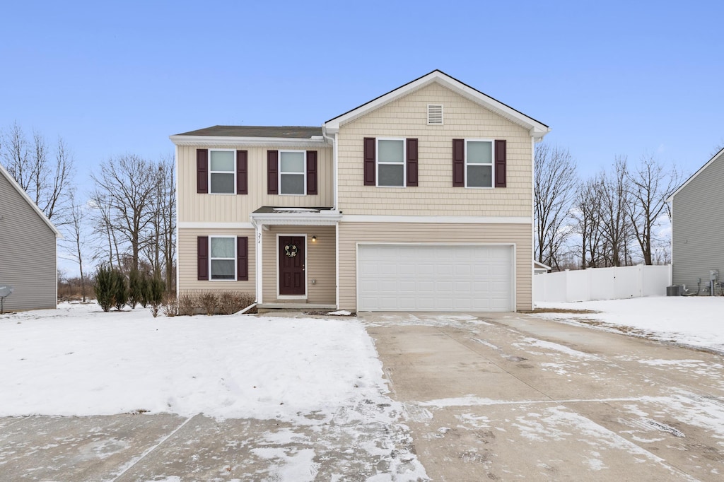 view of front property featuring a garage