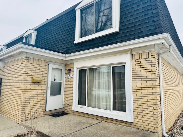 property entrance with a patio