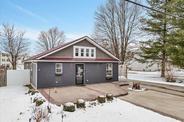 view of front of property with a patio