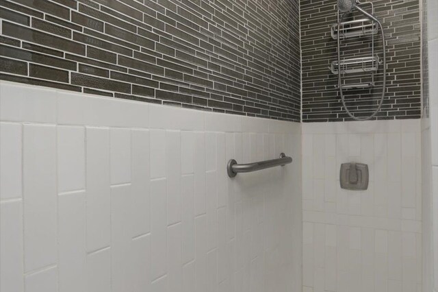 details with a tile shower