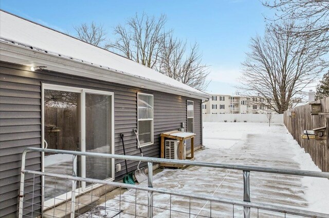 view of snow covered deck