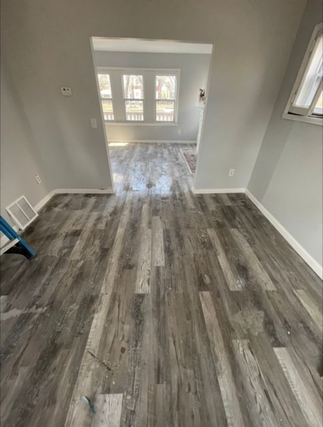 interior space with dark hardwood / wood-style floors