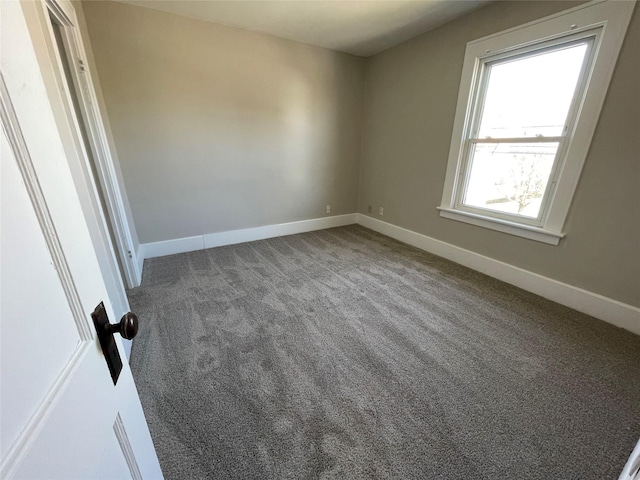 empty room featuring carpet floors