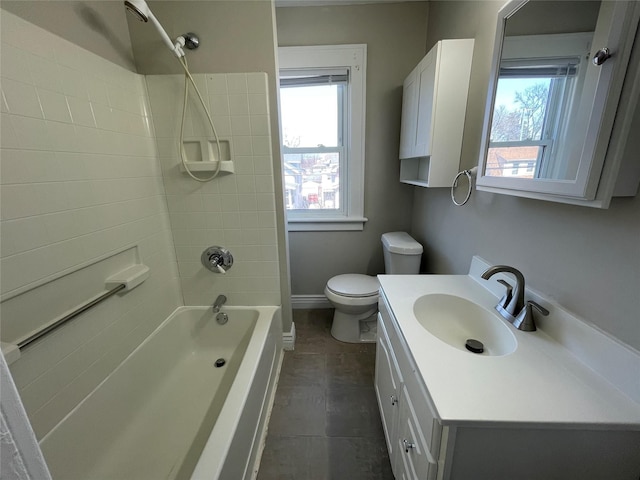 full bathroom with vanity, toilet, a wealth of natural light, and bathtub / shower combination