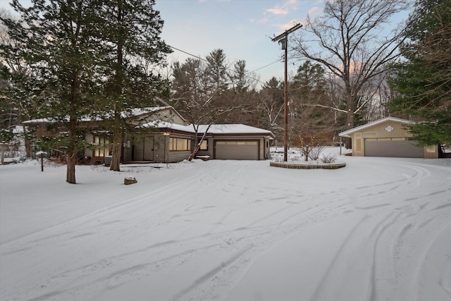 view of front of home featuring an outbuilding and a garage