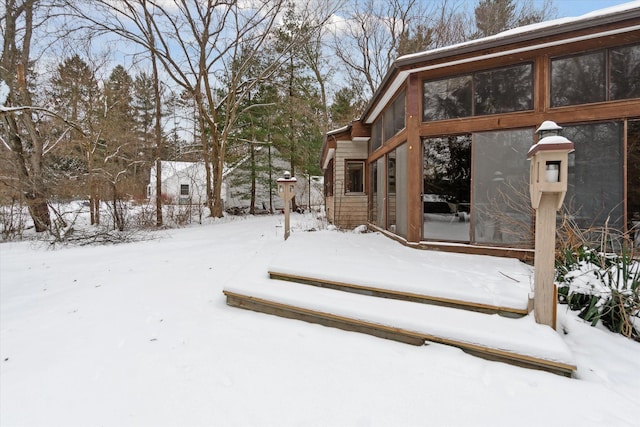 view of yard covered in snow