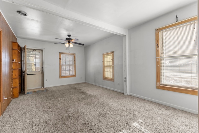 carpeted empty room with ceiling fan