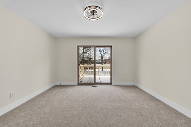 view of carpeted spare room