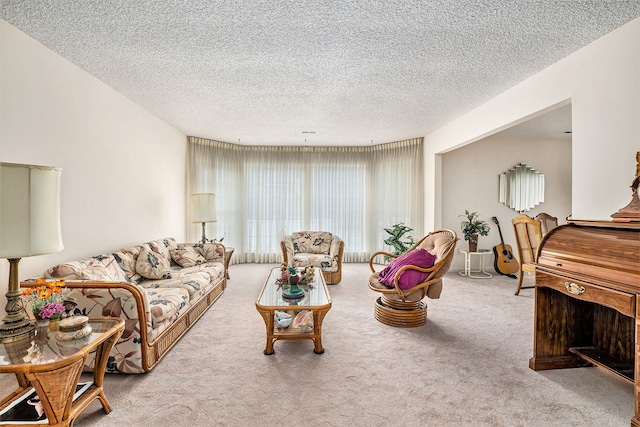 living room with light colored carpet and a textured ceiling