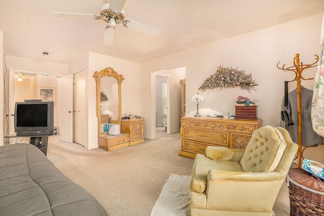 carpeted bedroom featuring ceiling fan