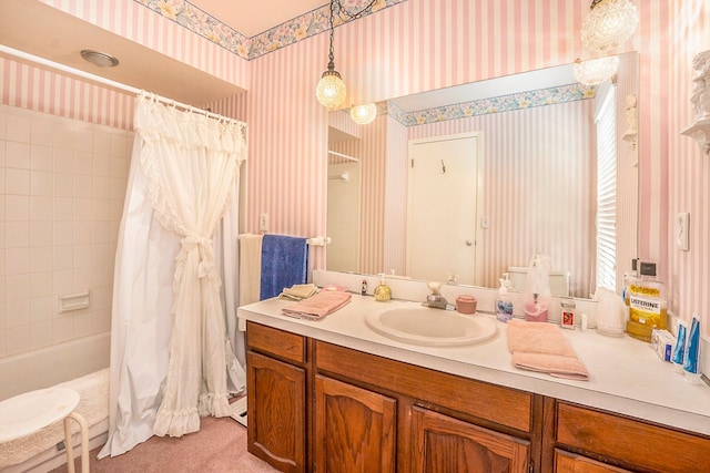 bathroom featuring vanity and shower / tub combo