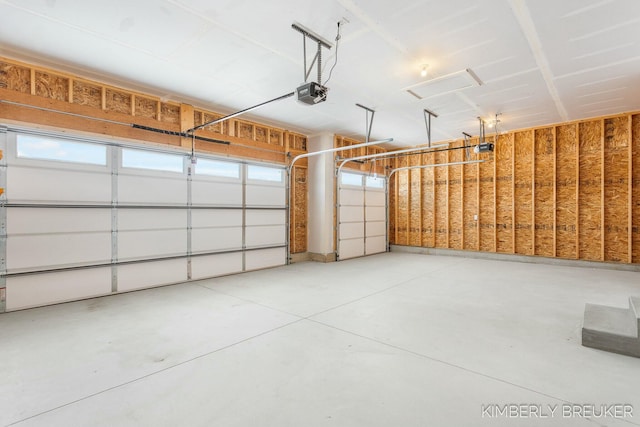 garage featuring a garage door opener