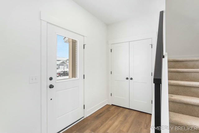 entryway with hardwood / wood-style flooring