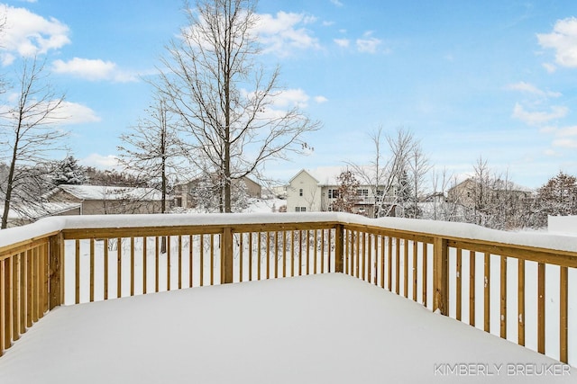 view of snow covered deck