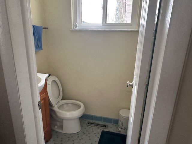 bathroom featuring toilet