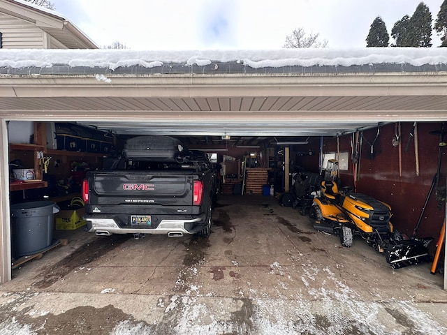 view of snow covered garage