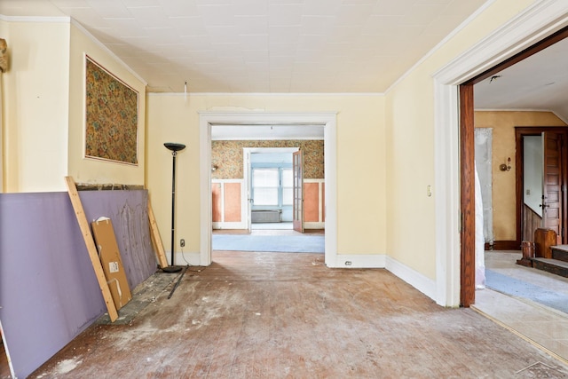 spare room with crown molding