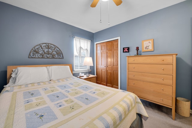 bedroom with carpet floors, a closet, and ceiling fan