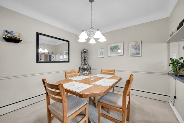 dining room with a baseboard heating unit, light carpet, and a chandelier