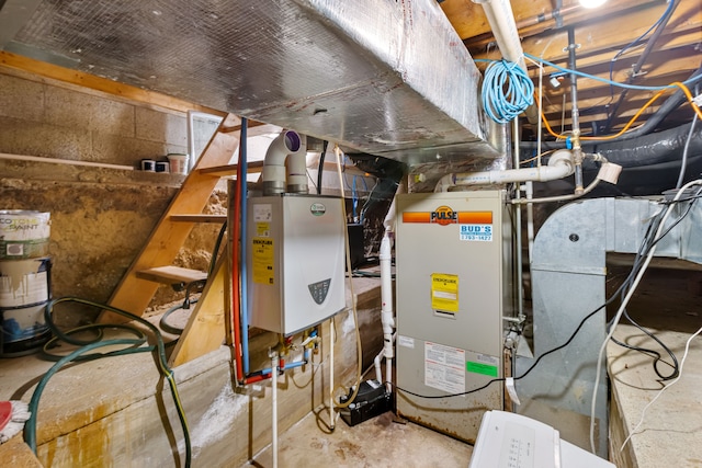 utility room featuring tankless water heater