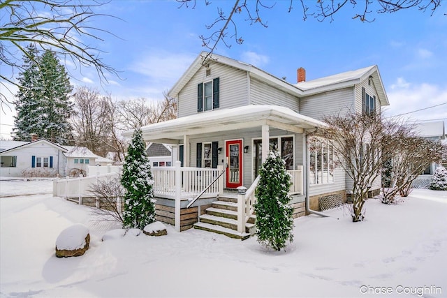 view of front of property featuring covered porch