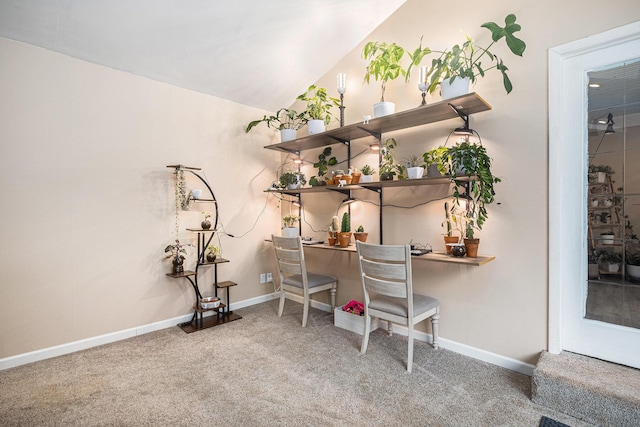 office area with carpet floors and lofted ceiling