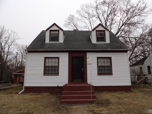 view of new england style home