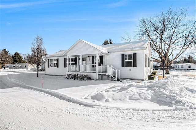 ranch-style home featuring covered porch