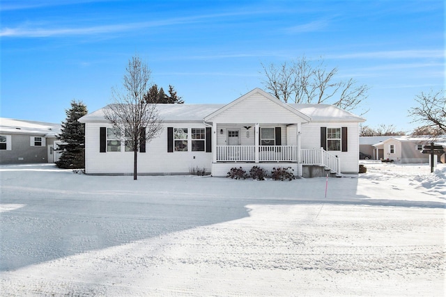 ranch-style home featuring covered porch