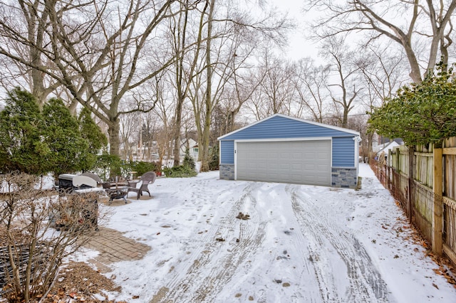 view of snow covered garage