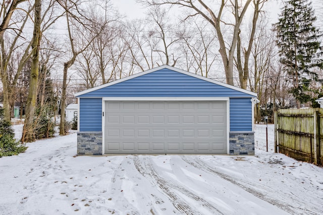 view of snow covered garage