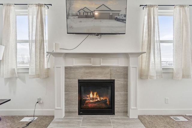 interior details with a fireplace