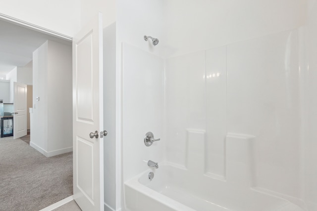 bathroom with shower / washtub combination