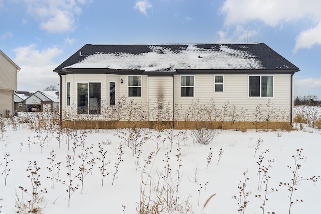 view of snow covered property