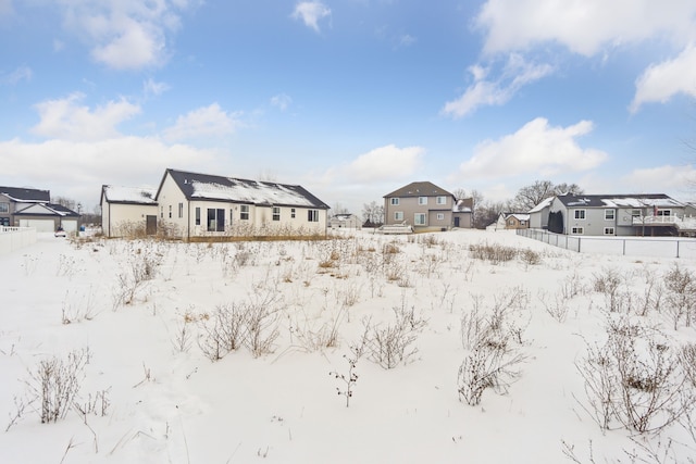 view of yard layered in snow