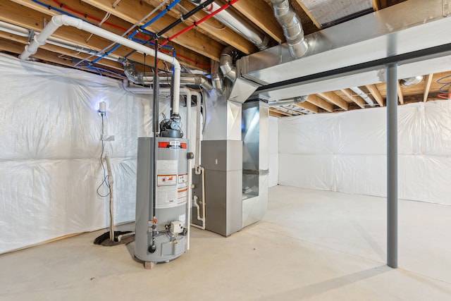 basement featuring water heater and heating unit