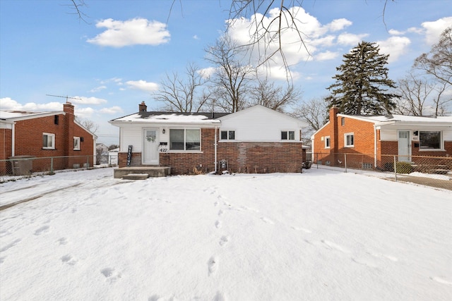 view of snow covered house