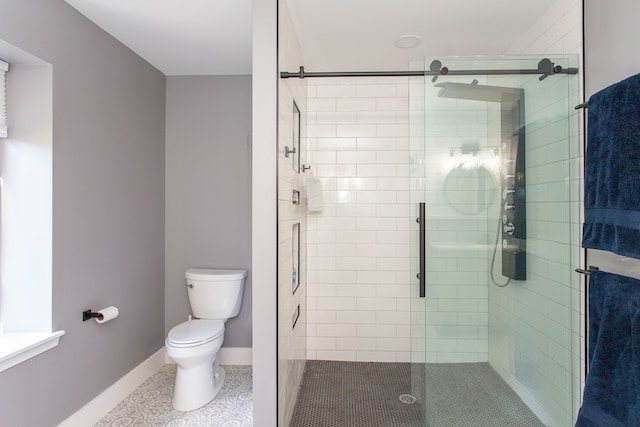 bathroom with toilet, walk in shower, and tile patterned floors