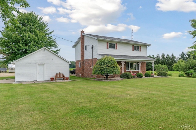 back of property with a lawn