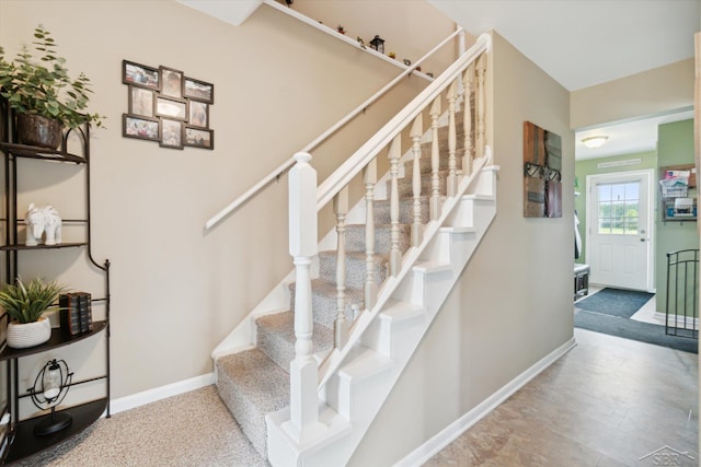 staircase with carpet