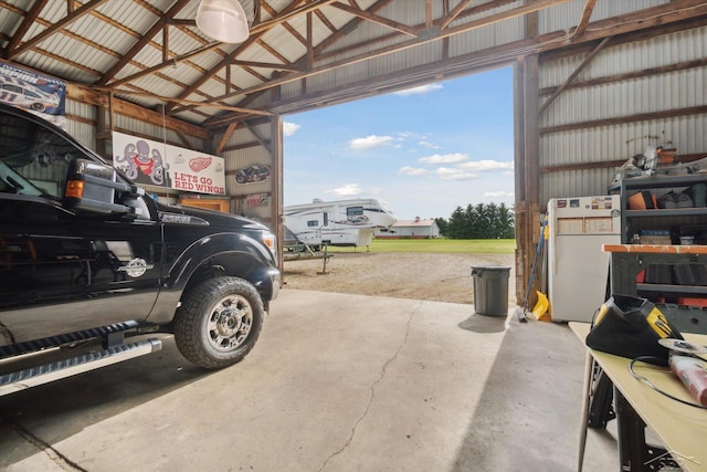 garage with white refrigerator