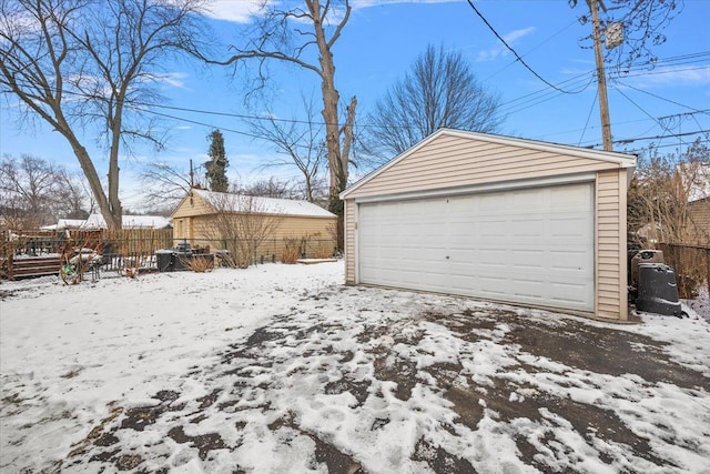 view of snow covered garage