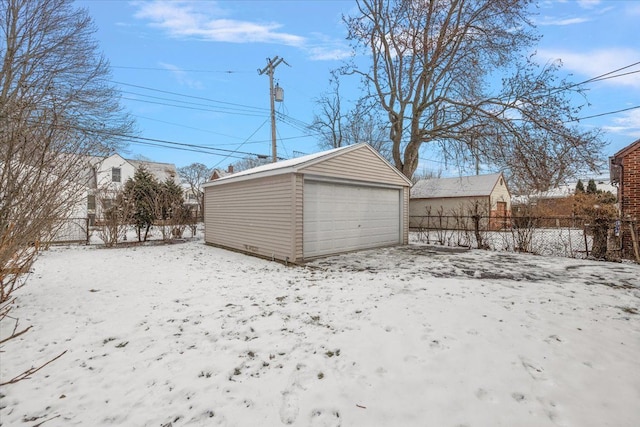 view of snow covered garage