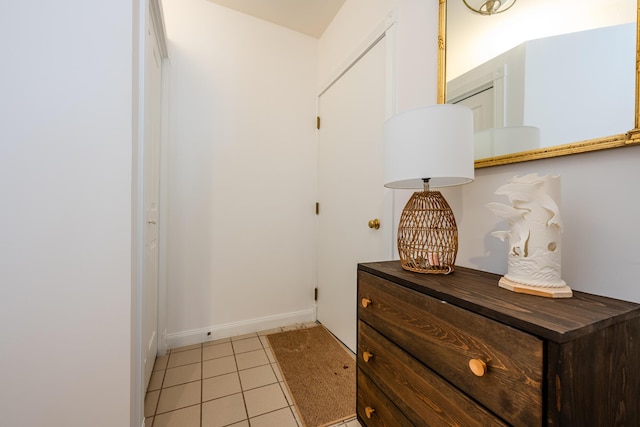 doorway featuring light tile patterned floors