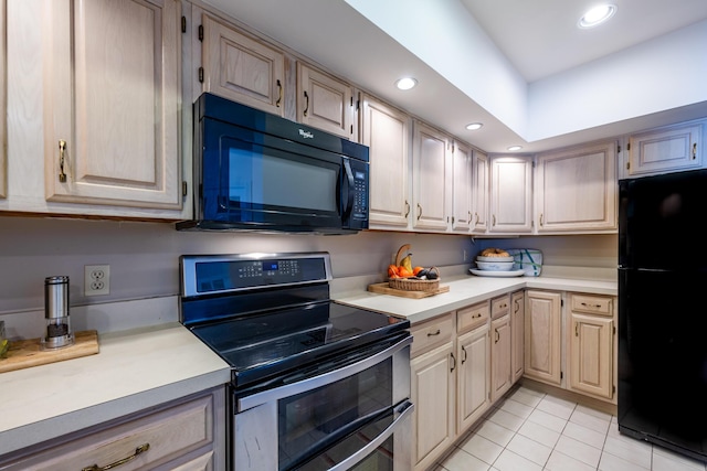 kitchen featuring recessed lighting, light countertops, light brown cabinets, light tile patterned flooring, and black appliances